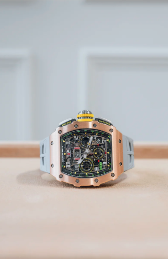 Luxury watch with a detailed face on a light surface