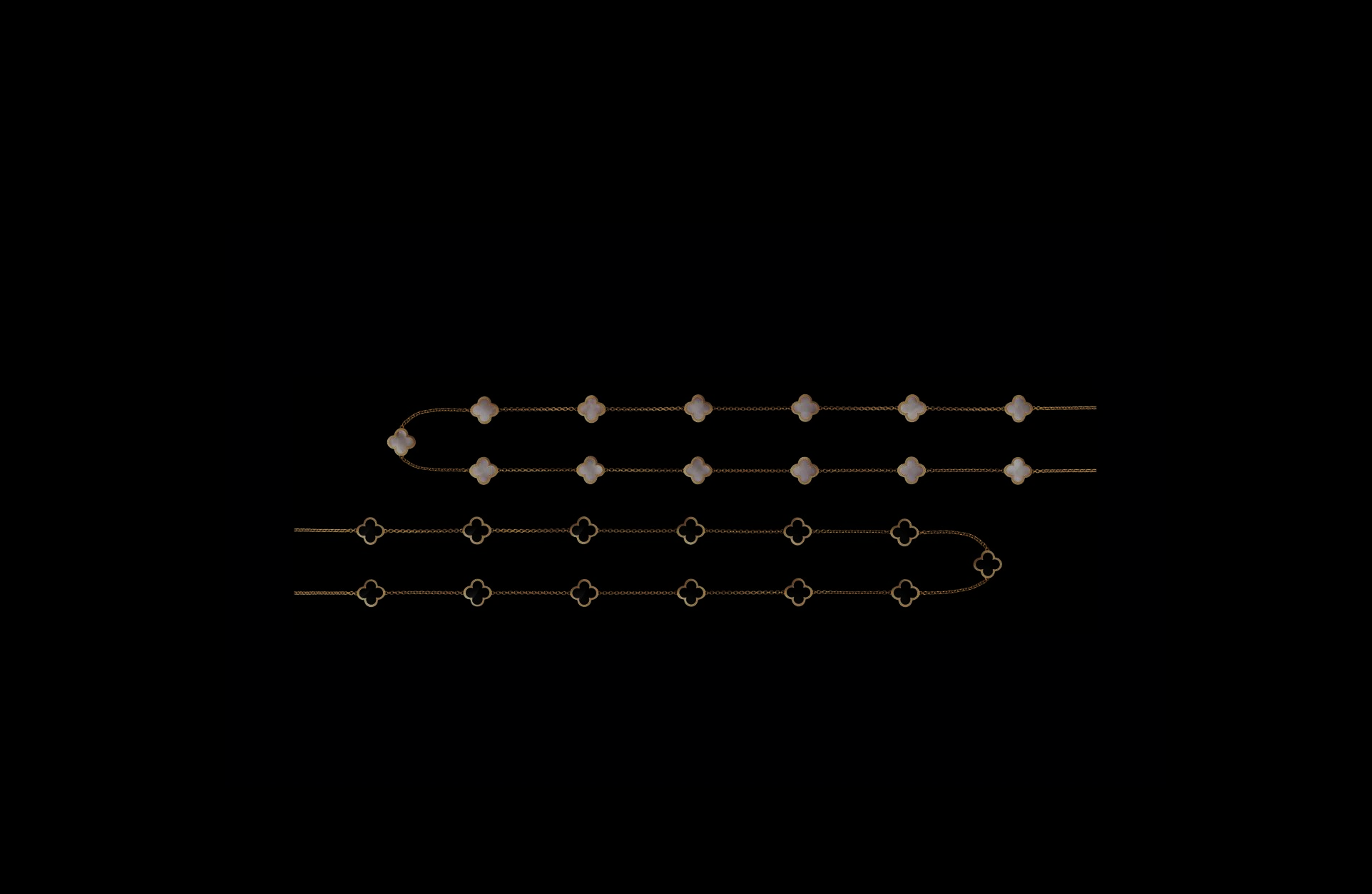 Two elegant gold necklaces are displayed against a black background. The top necklace features white floral charms, while the bottom has gold quatrefoil motifs.